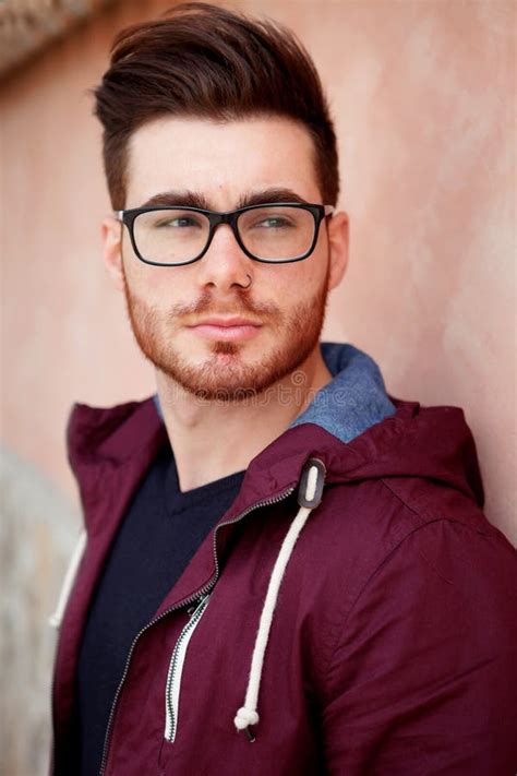 a man wearing glasses|handsome guys with glasses.